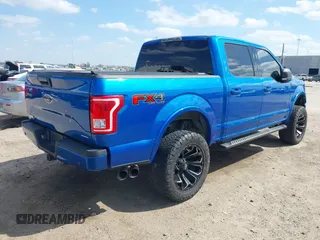 2015 Ford F-150 XLT with VIN 1FTEW1EF8FKD15133, listed as a IAAI auction lot 41763935 with 139,721 mi miles. Bid and sale history available at carsss.com. Image 4.