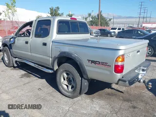 2001 Toyota Tacoma PreRunner z VIN 5TEGN92N51Z804874, wystawiony jako IAAI lot #41861876 z przebiegiem 201 333 mil mil oraz . Historia ofert i sprzedaży dostępna na DreamBid. Obrazek 3.