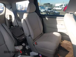 2019 Kia Sedona L with VIN KNDMA5C11K6539162, listed as a IAAI auction lot 41150477 with 76,847 mi miles. Bid and sale history available at carsss.com. Image 8.