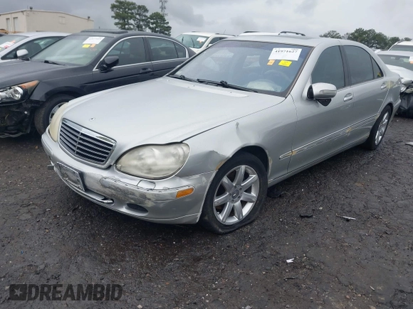 2002 Mercedes-Benz S-Class 5.0L with VIN WDBNG75J32A241980, listed as a IAAI auction lot 41971627 with 160,634 mi miles. Bid and sale history available at carsss.com. Image 2.