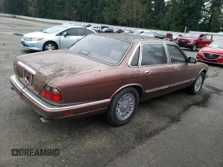 1995 Jaguar XJ with VIN SAJKX1742SC746763, listed as a Copart auction lot 84949964 with Not Provided miles and Clean Title. Bid and sale history available at DreamBid. Image 3.