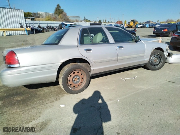 2011 Ford Crown Victoria LX with VIN 2FABP7EV5BX175209, listed as a Copart auction lot 83352084 with 141,328 mi miles and Salvage Title. Bid and sale history available at carsss.com. Image 3.