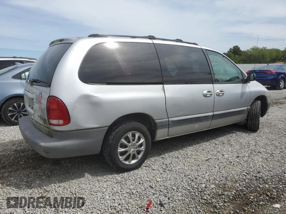 2000 Chrysler Voyager SE z VIN 1C4GJ44G5YB803736, wystawiony jako Copart lot #69868004 z przebiegiem 94 549 mil mil oraz Czysty tytuł • Clean title. Historia ofert i sprzedaży dostępna na DreamBid. Obrazek 3.