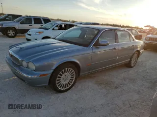 2005 Jaguar XJ VDP with VIN SAJWA82C65SG45247, listed as a Copart auction lot 77950594 with 0 mi miles and Salvage Title. Bid and sale history available at carsss.com. Image 1.