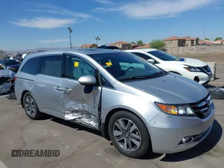 2014 Honda Odyssey Touring с VIN 5FNRL5H98EB070983, выставлен на аукционе IAAI как лот 42328380 с пробегом Не указан миль и . История ставок и продаж доступна на DreamBid. Изображение 1.