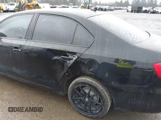 2011 Volkswagen Jetta SE z VIN 3VWDZ7AJXBM323766, wystawiony jako IAAI lot #41680351 z przebiegiem 122 660 mil mil oraz . Historia ofert i sprzedaży dostępna na DreamBid. Obrazek 6.