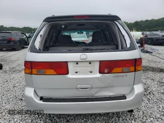 2004 Honda Odyssey EX-L with VIN 5FNRL18044B069774, listed as a Copart auction lot 57096535 with 165,307 mi miles and Salvage title. Bid and sale history available at DreamBid. Image 6.