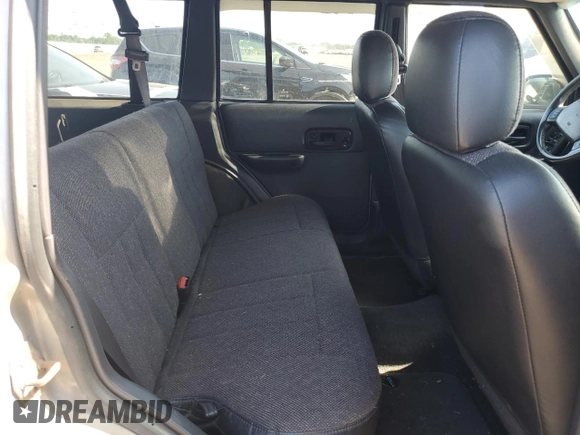 2001 Jeep Cherokee Sport z VIN 1J4FF58S61L540796, wystawiony jako Copart lot #62384895 z przebiegiem 209 294 mil mil oraz Czysty tytuł • Clean title. Historia ofert i sprzedaży dostępna na DreamBid. Obrazek 10.