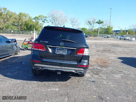 2018 Mercedes-Benz GLE with VIN 4JGDA5JB1JB080258, listed as a IAAI auction lot 41668094 with NaN miles. Bid and sale history available at carsss.com. Image 15.