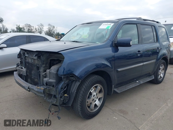 2009 Honda Pilot Touring with VIN 5FNYF48929B040199, listed as a IAAI auction lot 41466006 with 167,959 mi miles and . Bid and sale history available at carsss.com. Image 18.