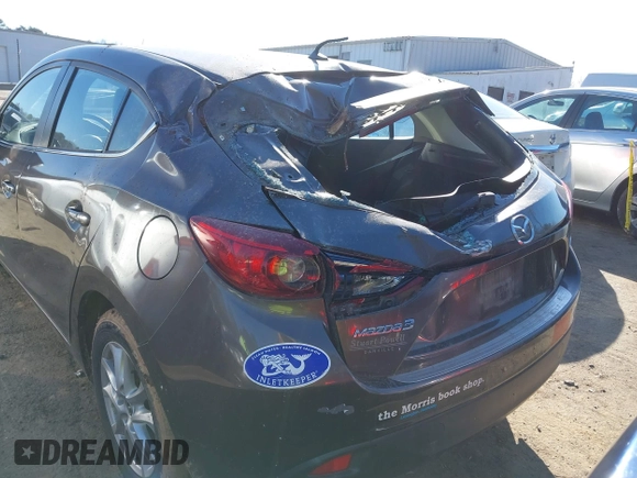 2014 Mazda 3 i Touring with VIN JM1BM1L70E1109815, listed as a IAAI auction lot 41611536 with 98,860 mi miles and . Bid and sale history available at DreamBid. Image 6.