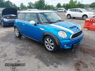 2010 MINI Hardtop S with VIN WMWMF7C55ATW88946, listed as a IAAI auction lot 42443200 with 104,953 mi miles and . Bid and sale history available at DreamBid. Image 1.