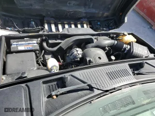 2005 Hummer H2 SUT with VIN 5GRGN22U65H113129, listed as a Copart auction lot 77315854 with 185,197 mi miles and Salvage Title. Bid and sale history available at carsss.com. Image 11.