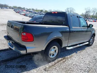 2003 Ford F-150 XLT with VIN 1FTRW07653KC18900, listed as a IAAI auction lot 41979710 with 99,525 mi miles. Bid and sale history available at carsss.com. Image 4.