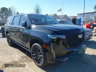 2022 Cadillac Escalade ESV Sport Platinum z VIN 1GYS4RKL1NR154013, wystawiony jako IAAI lot #41477366 z przebiegiem 118 288 mil mil oraz . Historia ofert i sprzedaży dostępna na DreamBid. Obrazek 1.