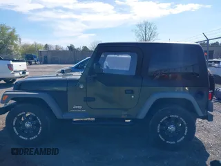 2006 Jeep Wrangler SE with VIN 1J4FA29116P763914, listed as a IAAI auction lot 42140140 with 107,161 mi miles. Bid and sale history available at carsss.com. Image 15.