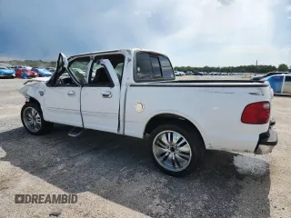 2001 Ford F-150 XLT with VIN 1FTRW07W71KE61878, listed as a Copart auction lot 60516665 with Not provided miles and Salvage title. Bid and sale history available at DreamBid. Image 2.