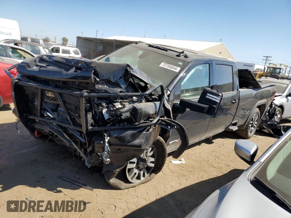 2023 GMC Sierra 3500HD AT4 z VIN 1GT49VEY1PF260918, wystawiony jako Copart lot #72765654 z przebiegiem 13 596 mil mil oraz Szkoda całkowita • Salvage title. Historia ofert i sprzedaży dostępna na DreamBid. Obrazek 1.