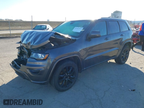 2017 Jeep Grand Cherokee Laredo with VIN 1C4RJFAG7HC769642, listed as a IAAI auction lot 41367874 with 128,095 mi miles. Bid and sale history available at carsss.com. Image 17.