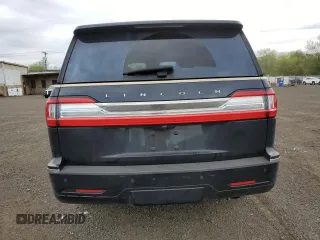 2019 Lincoln Navigator Reserve z VIN 5LMJJ2LT7KEL13810, wystawiony jako Copart lot #54428105 z przebiegiem 112 010 mil mil oraz Szkoda całkowita • Salvage title. Historia ofert i sprzedaży dostępna na DreamBid. Obrazek 6.