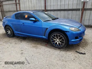 2005 Mazda RX-8 with VIN JM1FE173450144529, listed as a Copart auction lot 56769284 with 0 mi miles and Salvage Title. Bid and sale history available at carsss.com. Image 4.