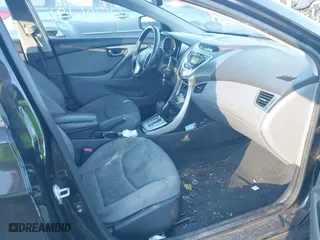 2012 Hyundai Elantra GLS with VIN KMHDH4AE8CU254219, listed as a IAAI auction lot 41206192 with 210,817 mi miles. Bid and sale history available at carsss.com. Image 5.