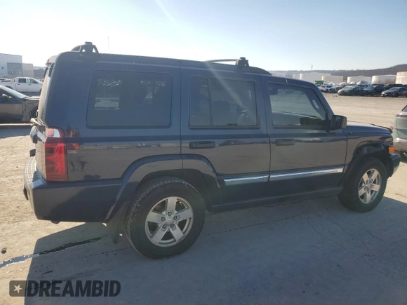 2006 Jeep Commander with VIN 1J8HH48K06C179567, listed as a Copart auction lot 88556105 with 196,696 mi miles and Salvage title. Bid and sale history available at DreamBid. Image 3.