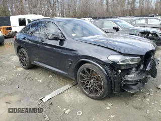 2023 BMW X4 M with VIN 5YM23EC03P9S24918, listed as a Copart auction lot 45127705 with 9,817 mi miles and Salvage Title. Bid and sale history available at carsss.com. Image 4.