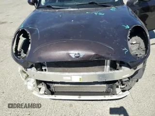 2015 MINI Hardtop 4 Door z VIN WMWXS5C57FT829133, wystawiony jako Copart lot #58764405 z przebiegiem 63 774 mil mil oraz Szkoda całkowita • Salvage title. Historia ofert i sprzedaży dostępna na DreamBid. Obrazek 11.