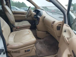 1998 Chrysler Town & Country LXi with VIN 1C4GP64L9WB664179, listed as a IAAI auction lot 42041600 with 1 mi miles. Bid and sale history available at carsss.com. Image 5.