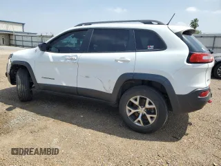 2014 Jeep Cherokee Trailhawk with VIN 1C4PJMBS9EW140344, listed as a Copart auction lot 50579005 with 117,326 mi miles and Salvage Title. Bid and sale history available at carsss.com. Image 2.