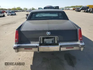 1985 Cadillac Eldorado z VIN 1G6EL5780FE622179, wystawiony jako Copart lot #54109205 z przebiegiem 73 403 mil mil oraz Szkoda całkowita • Salvage title. Historia ofert i sprzedaży dostępna na DreamBid. Obrazek 6.