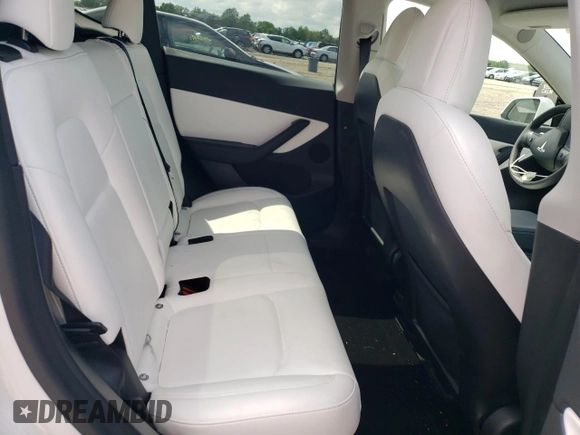 2022 Tesla Model Y Performance z VIN 7SAYGDEF4NF389191, wystawiony jako Copart lot #61443135 z przebiegiem 70 612 mil mil oraz Szkoda całkowita • Salvage title. Historia ofert i sprzedaży dostępna na DreamBid. Obrazek 10.