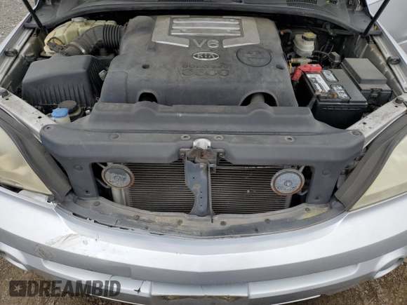 2006 Kia Sorento LX with VIN KNDJD733265522597, listed as a Copart auction lot 53667805 with 97,823 mi miles and Salvage Title. Bid and sale history available at DreamBid. Image 12.