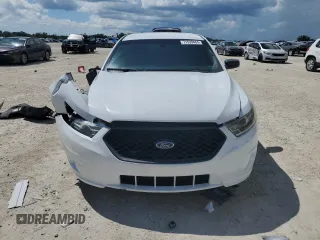 2015 Ford Police Interceptor with VIN 1FAHP2L84FG148962, listed as a Copart auction lot 71539464 with 140,072 mi miles and Salvage title. Bid and sale history available at DreamBid. Image 5.