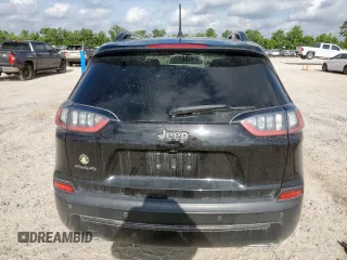 2021 Jeep Cherokee Latitude Lux с VIN 1C4PJMMX8MD122226, выставлен на аукционе Copart как лот 59349865 с пробегом 105 356 миль миль и Списание • Salvage title. История ставок и продаж доступна на DreamBid. Изображение 6.