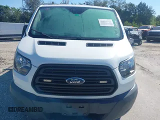 2018 Ford Transit with VIN 1FTYE1ZM0JKA39340, listed as a IAAI auction lot 41483588 with 91,512 mi miles and . Bid and sale history available at DreamBid. Image 12.