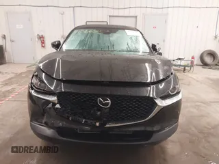 2021 Mazda CX-30 S with VIN 3MVDMBAL2MM265207, listed as a IAAI auction lot 41566325 with 62,587 mi miles and . Bid and sale history available at carsss.com. Image 12.