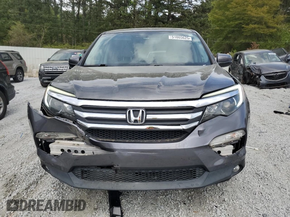 2016 Honda Pilot EX-L with VIN 5FNYF5H76GB035329, listed as a Copart auction lot 51865625 with 126,750 mi miles and Salvage Title. Bid and sale history available at DreamBid. Image 5.