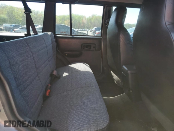 2000 Jeep Cherokee z VIN 1J4FF48S9YL220831, wystawiony jako Copart lot #54304615 z przebiegiem Nie podano mil oraz Szkoda całkowita • Salvage title. Historia ofert i sprzedaży dostępna na DreamBid. Obrazek 10.