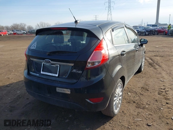 2014 Ford Fiesta Titanium z VIN 3FADP4FJXEM127644, wystawiony jako IAAI lot #41555040 z przebiegiem 107 046 mil mil oraz . Historia ofert i sprzedaży dostępna na DreamBid. Obrazek 4.