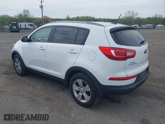 2013 Kia Sportage LX with VIN KNDPB3A20D7499468, listed as a IAAI auction lot 42090424 with 241,104 mi miles. Bid and sale history available at carsss.com. Image 3.