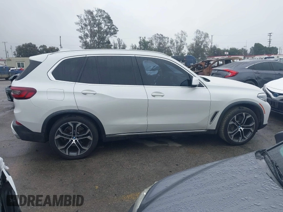 2021 BMW X5 sDrive40i with VIN 5UXCR4C03M9F24817, listed as a IAAI auction lot 41512172 with 54,867 mi miles. Bid and sale history available at carsss.com. Image 13.