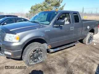 2005 Ford F-150 STX with VIN 1FTRX14W55NB19633, listed as a IAAI auction lot 41870057 with 100,436 mi miles. Bid and sale history available at carsss.com. Image 2.
