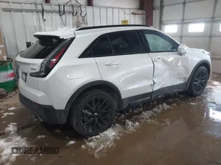 2023 Cadillac XT4 AWD Sport with VIN 1GYFZFR42PF111269, listed as a IAAI auction lot 41614455 with 21,866 mi miles. Bid and sale history available at carsss.com. Image 4.