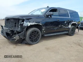 2017 Chevrolet Suburban LT with VIN 1GNSKHKCXHR194365, listed as a IAAI auction lot 42060690 with 213,424 mi miles and . Bid and sale history available at DreamBid. Image 2.