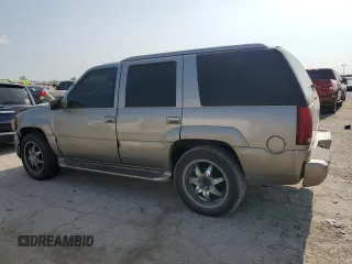 2000 Cadillac Escalade z VIN 1GYEK63R2YR210601, wystawiony jako Copart lot #64108944 z przebiegiem 186 964 mil mil oraz Szkody całkowita. Historia ofert i sprzedaży dostępna na DreamBid. Obrazek 2.