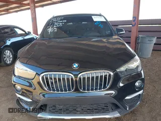 2018 BMW X1 sDrive28i z VIN WBXHU7C35J5L06673, wystawiony jako IAAI lot #42275787 z przebiegiem 61 204 mil mil oraz . Historia ofert i sprzedaży dostępna na DreamBid. Obrazek 12.