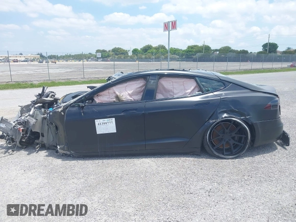 2021 Tesla Model S Plaid с VIN 5YJSA1E63MF451438, выставлен на аукционе IAAI как лот 41399777 с пробегом Не указан миль и . История ставок и продаж доступна на DreamBid. Изображение 13.