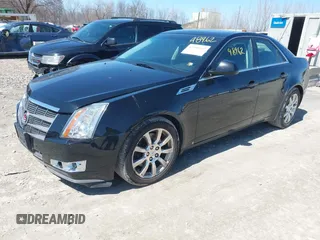 2008 Cadillac CTS AWD w/1SA with VIN 1G6DG577280147464, listed as a IAAI auction lot 42048962 with 132,683 mi miles. Bid and sale history available at carsss.com. Image 2.